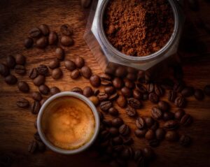 a-nice-photo-of-coffee-beans-ground-coffee-and-a-cup-of-coffee